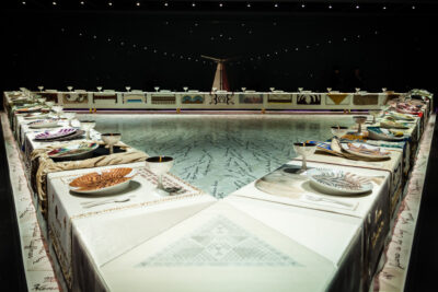 Exhibit by Judy Chicago titled "The Dinner Party" that makes a reference to D'Aragona
